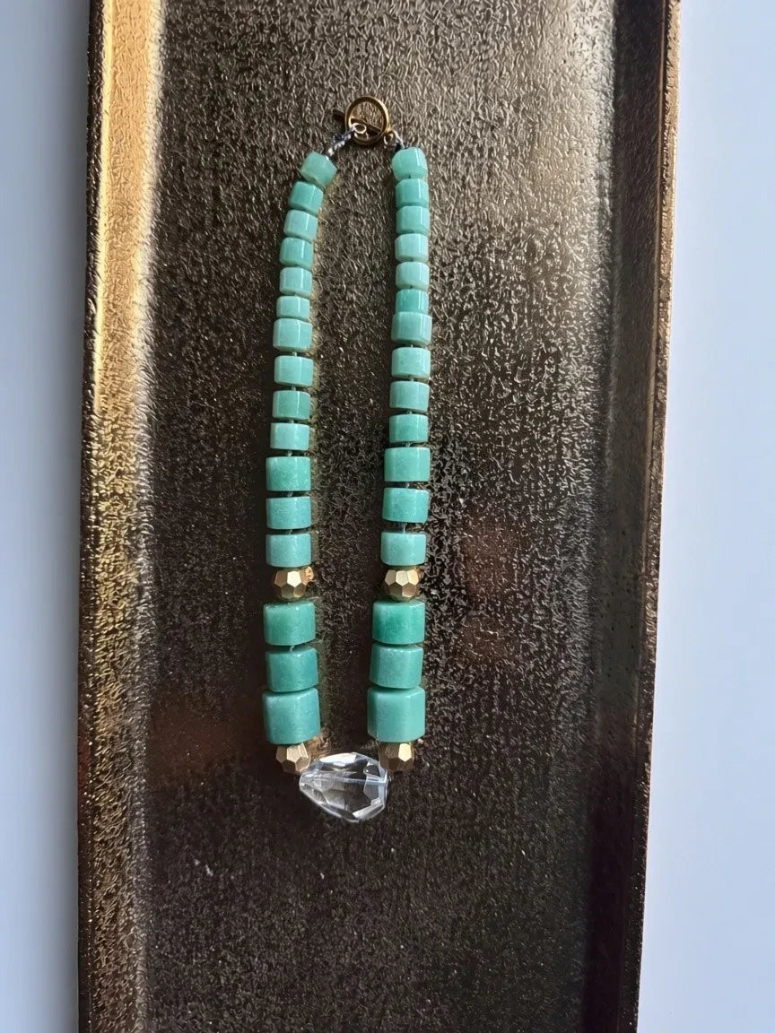 Hue La La Gems statement necklace featuring seafoam green cube amazonite beads, gold-tone accents, and crystal pendant.