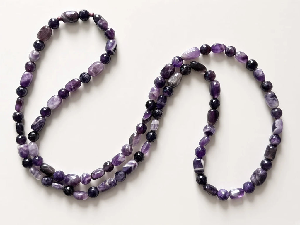 Hue La La Gems handcrafted amethyst beaded necklace featuring polished oval and faceted round violet gemstone beads.