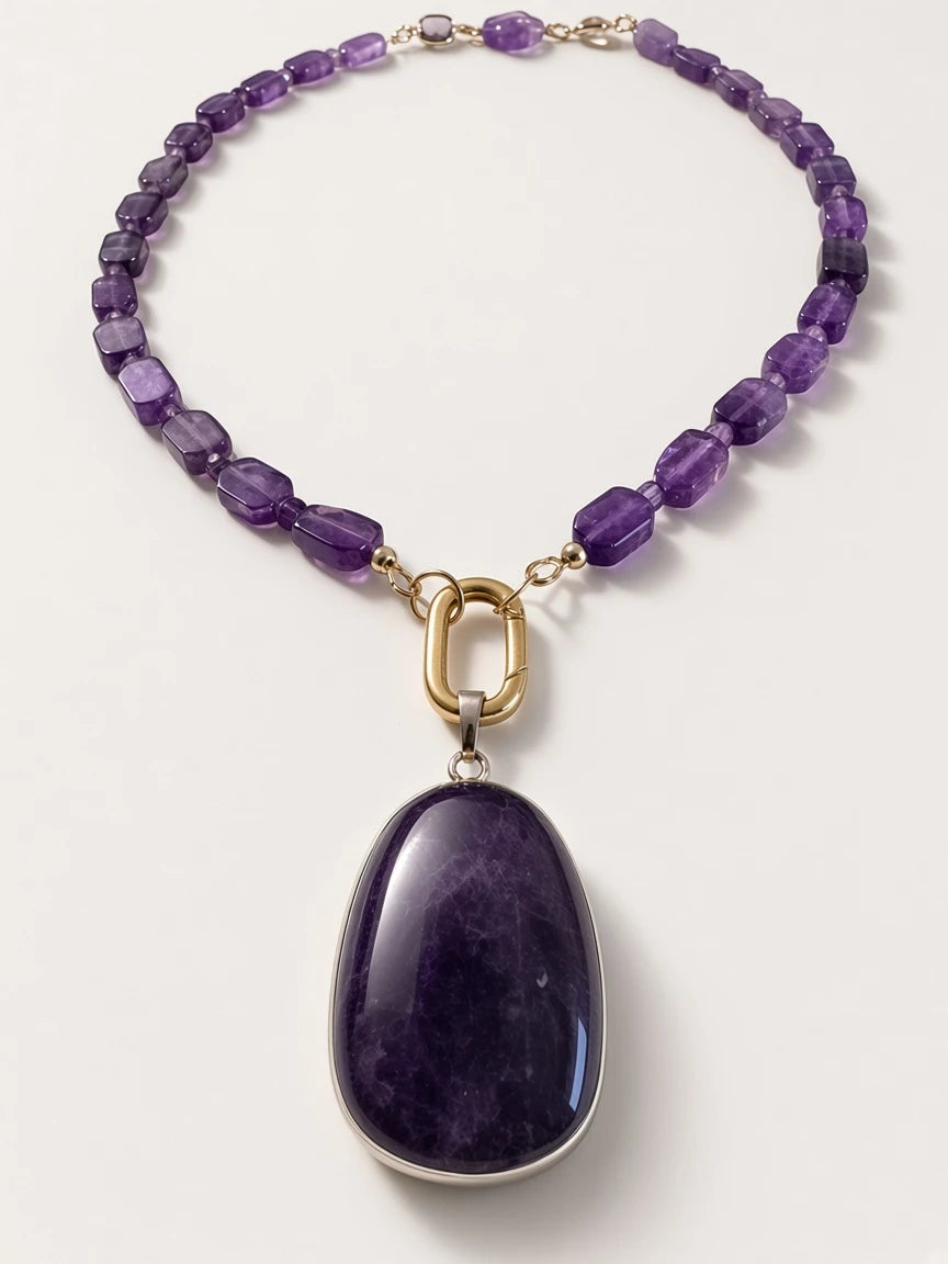 Hue La La Gems amethyst beaded necklace with a large pendant and gold-tone oval clasp on a white background