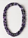 Hue La La Gems handcrafted amethyst beaded necklace featuring polished oval and faceted round violet gemstone beads.