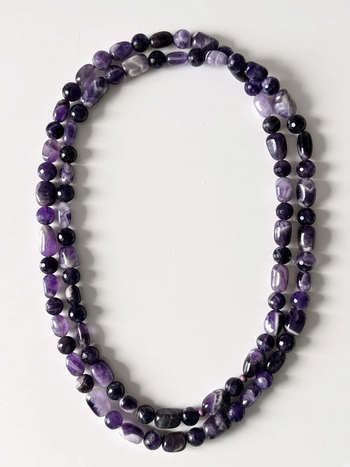 Hue La La Gems handcrafted amethyst beaded necklace featuring polished oval and faceted round violet gemstone beads.