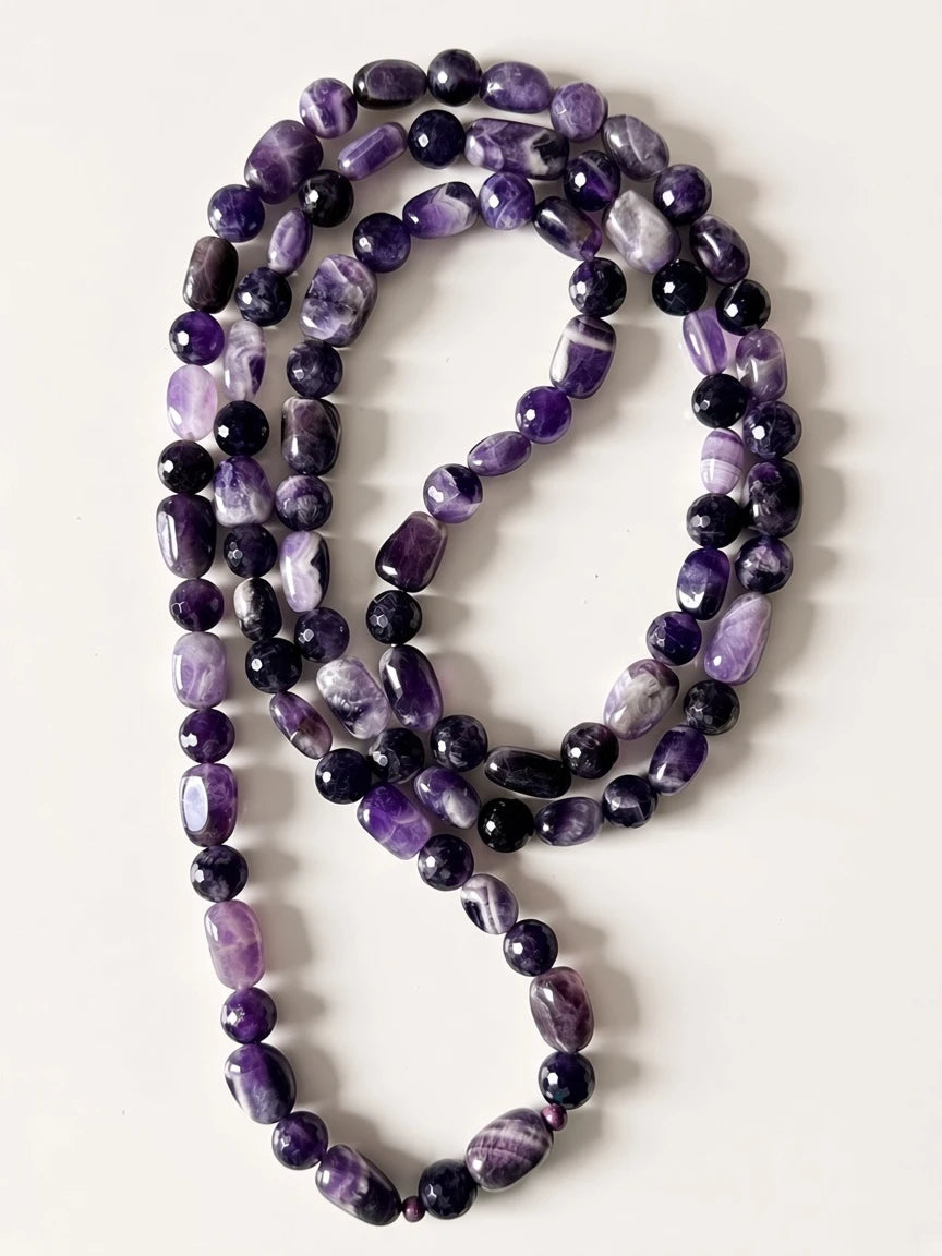Hue La La Gems handcrafted amethyst beaded necklace featuring polished oval and faceted round violet gemstone beads.