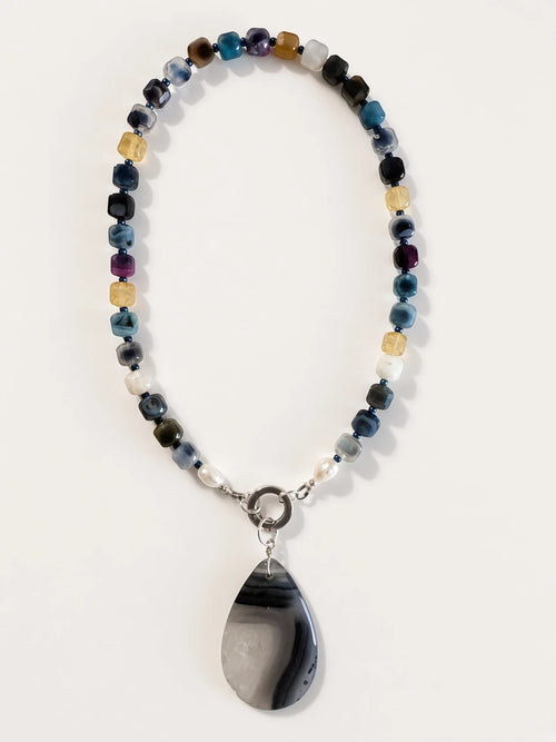 Hue La La Gems handcrafted statement necklace with multi-colored cube gemstone beads, freshwater pearls, and agate pendant
