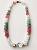 Hue La La Gems beaded statement necklace with square green, pink, and white stones, gold accents, and crystal pendant.