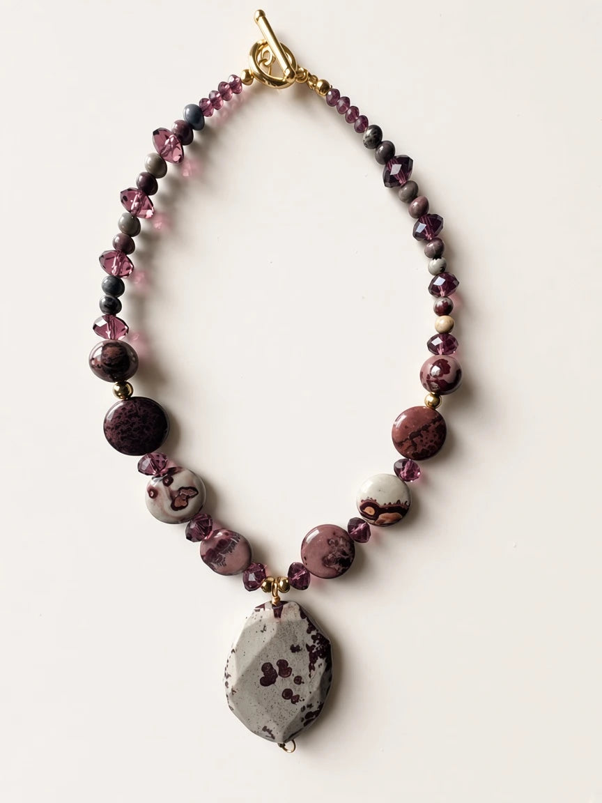 Hue La La Gems statement necklace with plum and grey natural stone beads, purple crystals, and a faceted pendant.