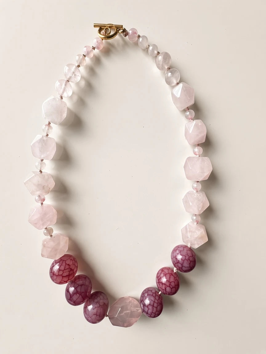 Hue La La Gems statement necklace featuring rose quartz and crackled berry agate beads with a gold-tone toggle clasp.