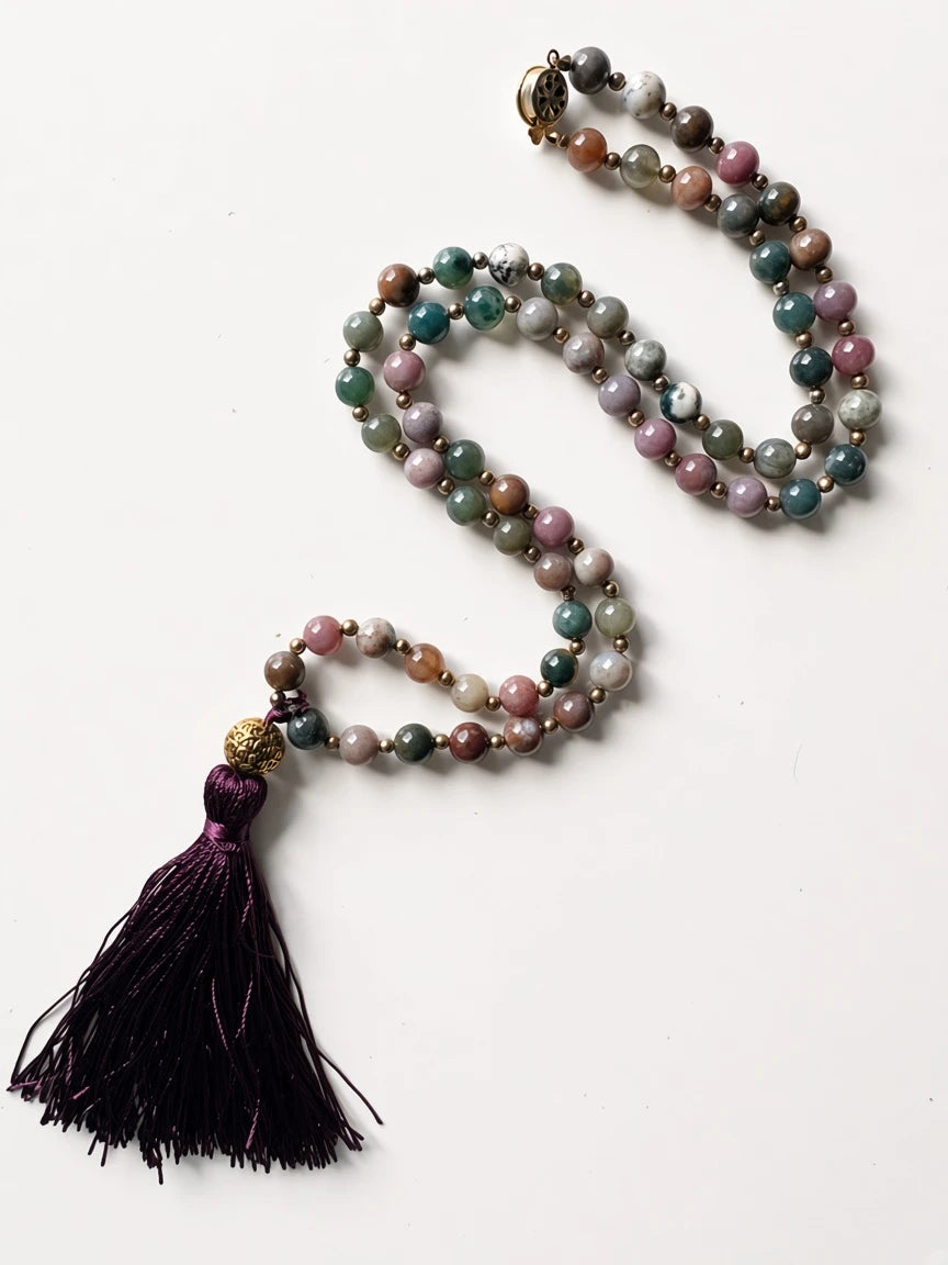 Hue La La Gems mala necklace featuring multi-colored gemstone beads, metallic spacers, and a deep purple silk tassel.