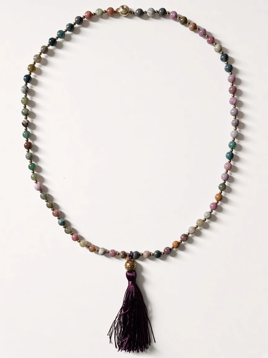 Hue La La Gems mala necklace with earthy gemstone beads, metallic spacers, and a deep purple silk tassel.