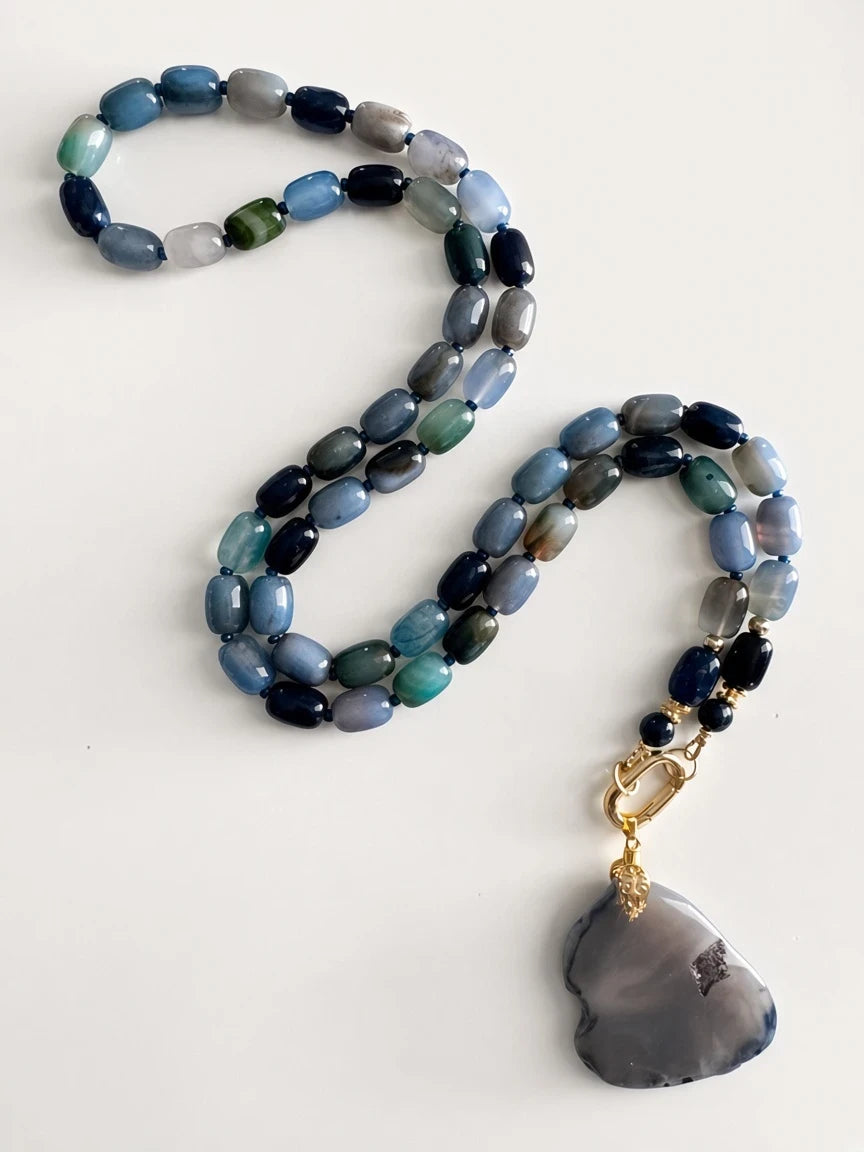 Hue La La Gems beaded necklace with blue and green agate stones, gold-tone clasp, and a large grey agate pendant.