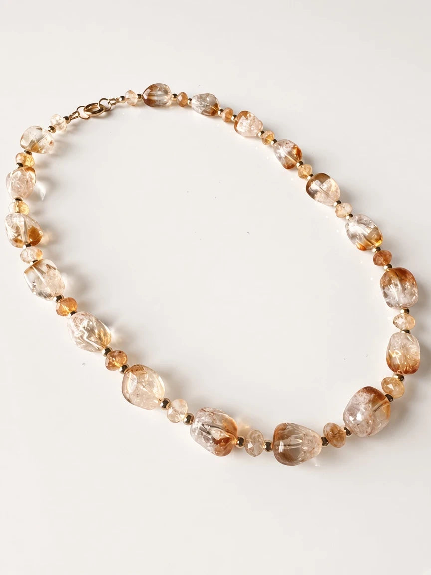 Hue La La Gems carnelian agate beaded necklace with warm orange and brown oval stones and gold-tone accents.