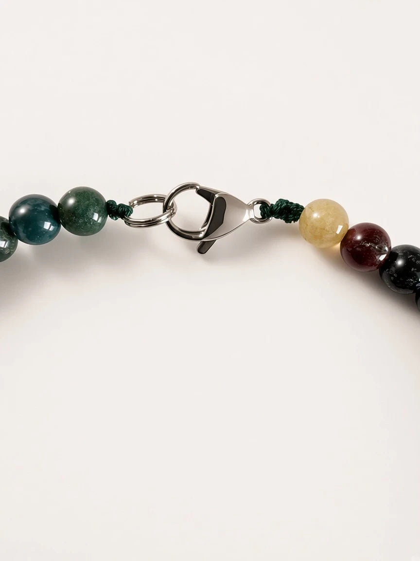 Hue La La Gems carnelian agate beaded necklace featuring a secure silver-tone lobster clasp and green cord detail.