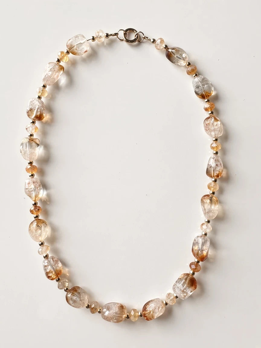 Hue La La Gems carnelian agate beaded necklace with warm orange and brown oval stones and gold-tone accents.