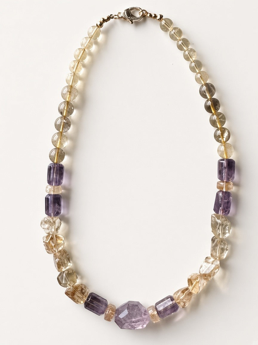 Hue La La Gems handcrafted statement necklace featuring natural citrine and amethyst beads in varied shapes.