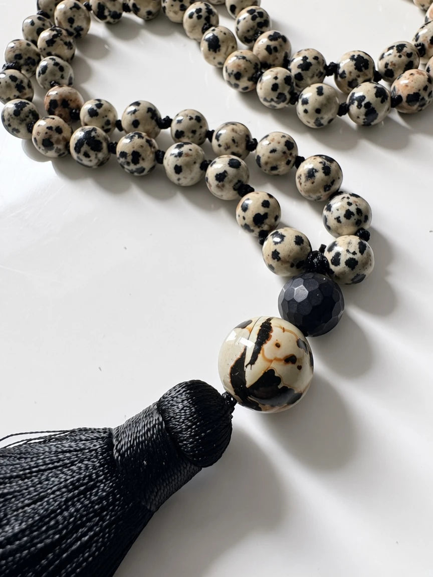 Hue La La Gems Dalmatian Jasper mala necklace with 108 hand-knotted beads and a black silk tassel.
