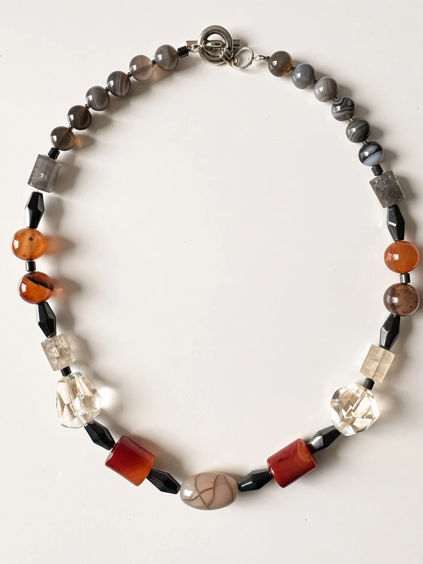 Hue La La Gems artisan statement necklace with carnelian, clear quartz, and agate beads on a silver-tone toggle clasp.