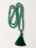 Hue La La Gems green aventurine mala necklace with 108 beads, silver Om charm, and deep green silk tassel.