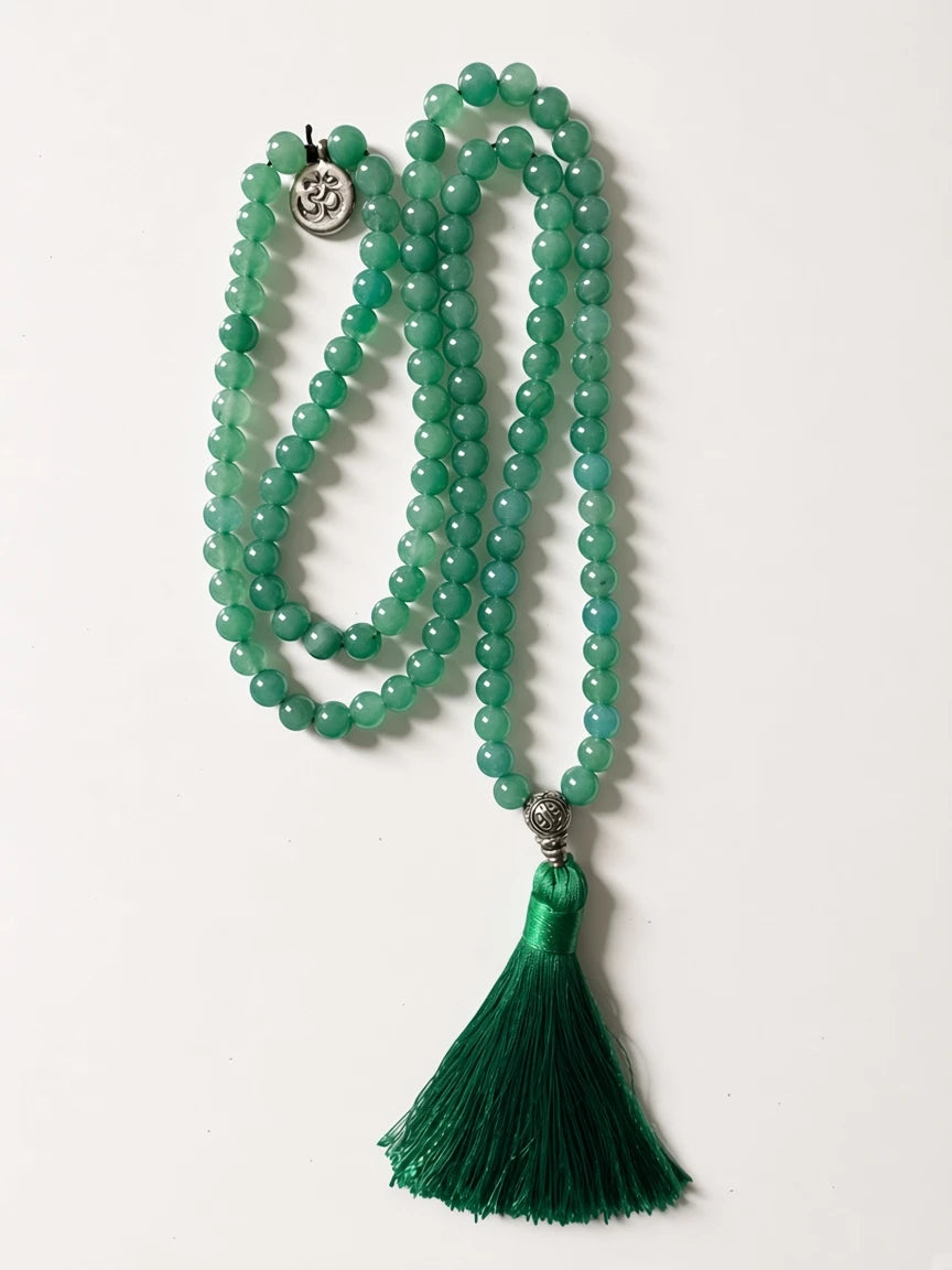 Hue La La Gems green aventurine mala necklace with 108 beads, silver Om charm, and deep green silk tassel.