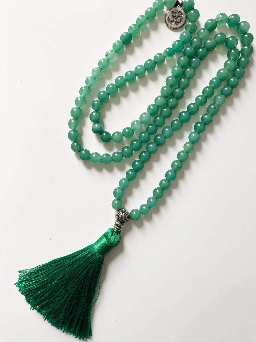 Hue La La Gems green aventurine 108-bead mala necklace with a silver Om charm and a deep green silk tassel