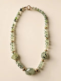 Hue La La Gems beaded statement necklace with pale green gemstone beads, faceted shapes, and gold-tone metal accents.