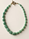Hue La La Gems statement necklace featuring faceted green jade rectangular beads and a gold-tone toggle clasp.