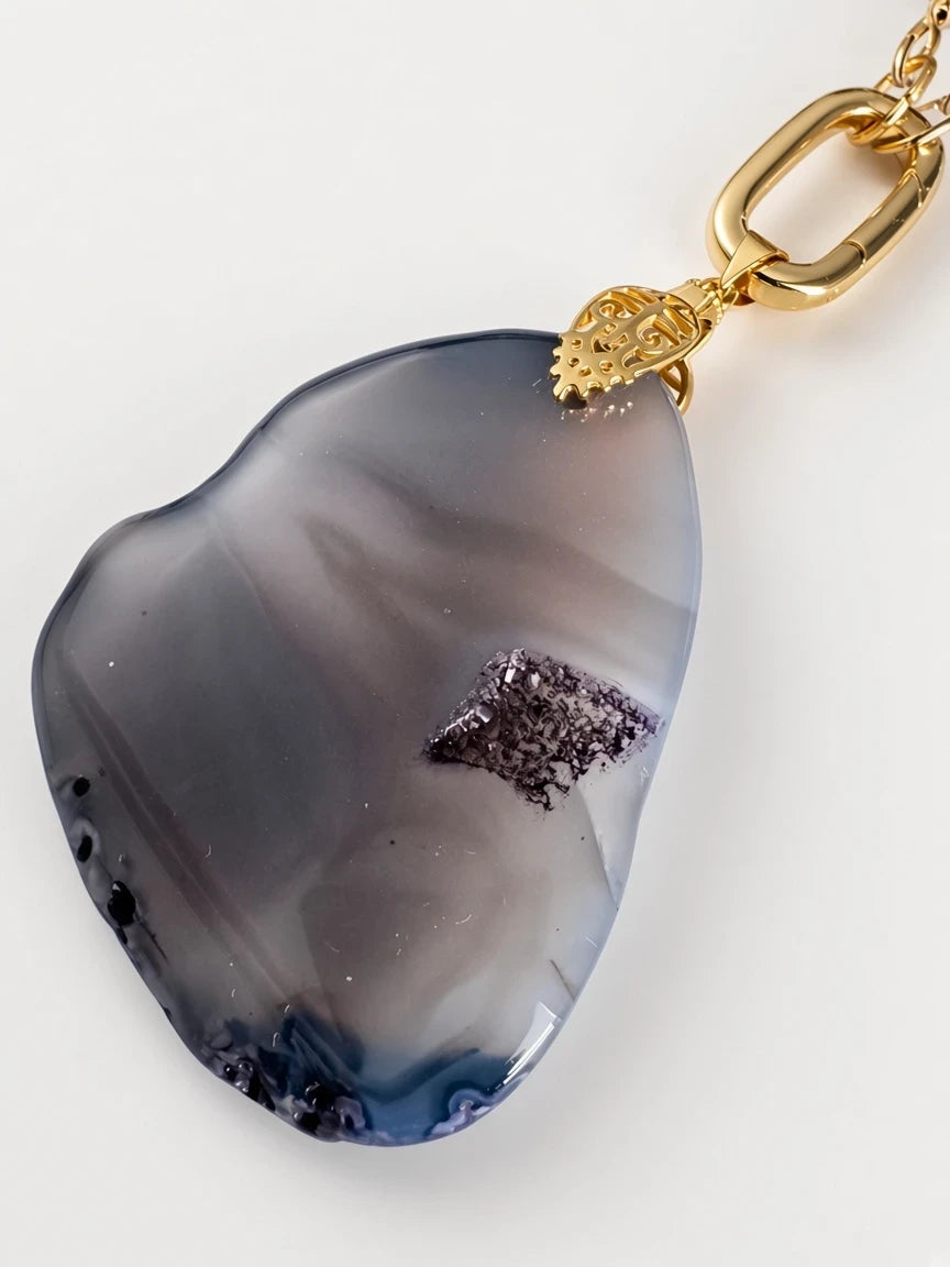 Hue La La Gems grey agate pendant necklace with a gold-tone metal link and textured decorative bail