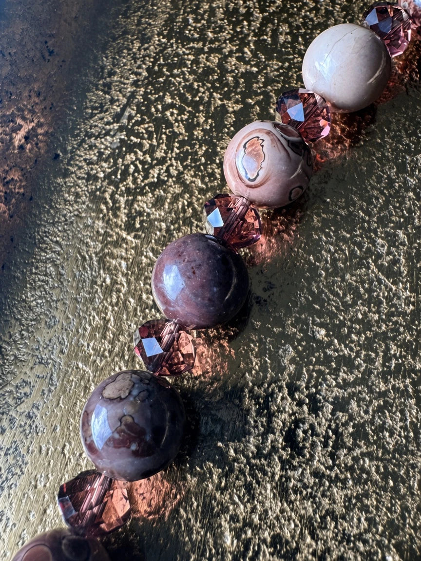Hue La La Gems statement necklace featuring mauve and plum natural stone beads with faceted crystal accents.