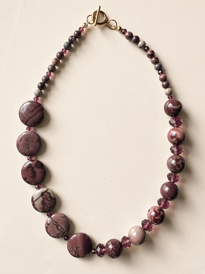 Hue La La Gems statement necklace featuring mauve and plum natural stone beads with faceted crystals and gold toggle