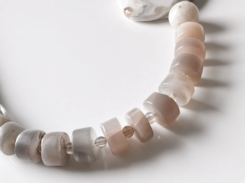 Hue La La Gems handcrafted statement necklace featuring smooth taupe and cream semi-precious stone beads