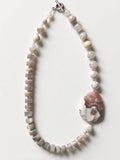 Hue La La Gems handcrafted statement necklace with neutral semi-precious stone beads and a large polished focal stone.
