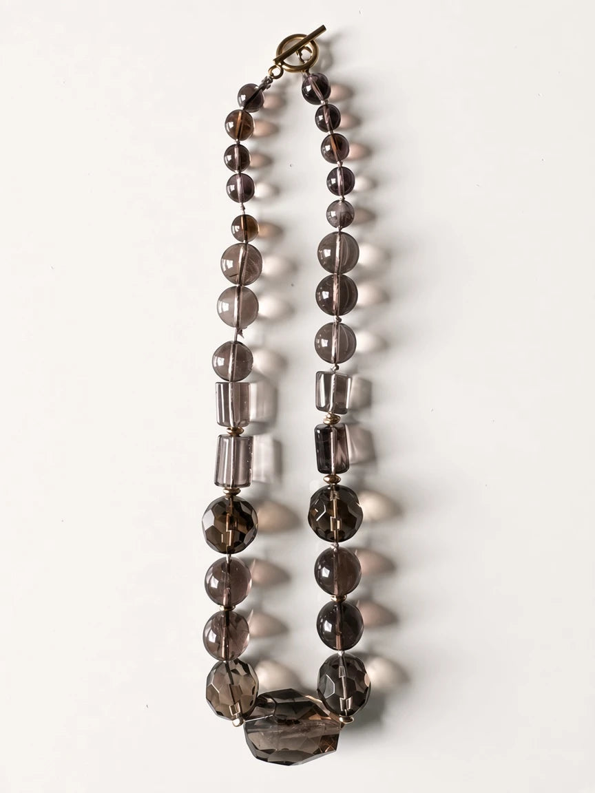 Hue La La Gems smoky quartz beaded statement necklace with mixed bead shapes and a gold-tone toggle clasp