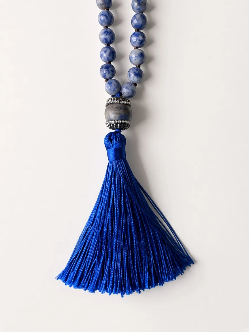 Hue La La Gems handcrafted mala necklace featuring blue sodalite beads and a vibrant royal blue silky tassel