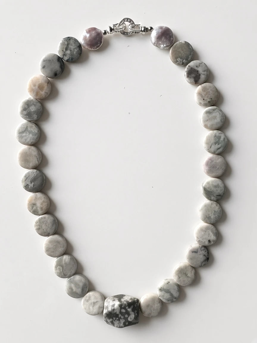 Hue La La Gems handcrafted stone bead necklace with grey and green circular beads and a faceted focal stone clasp