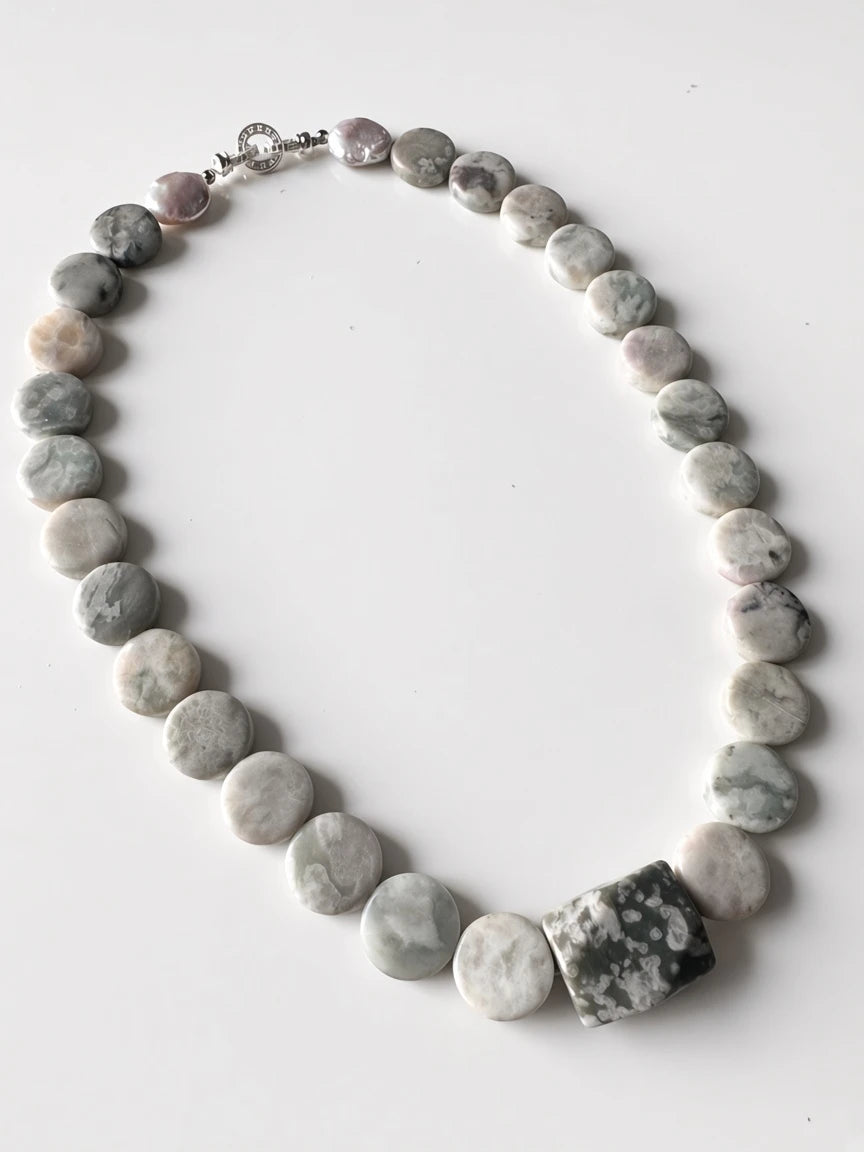 Hue La La Gems handcrafted stone bead necklace with grey and green circular beads and a faceted focal stone clasp