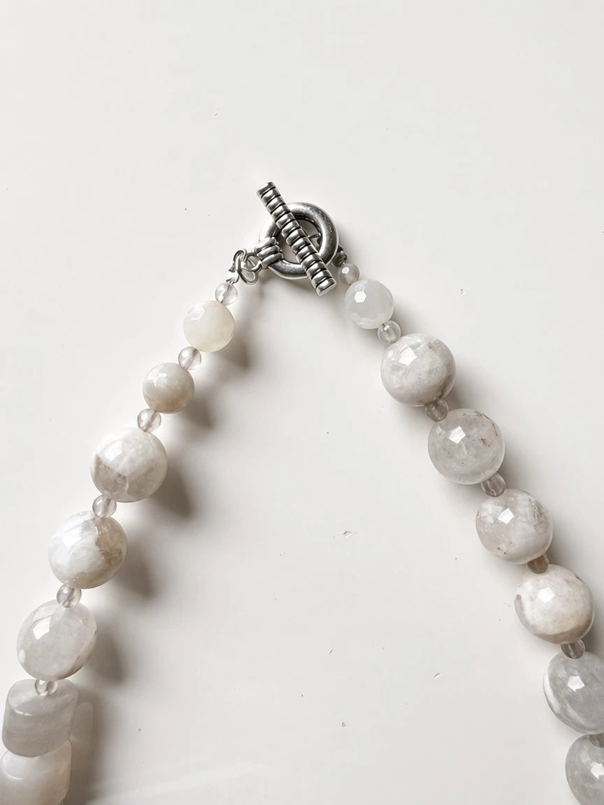 Hue La La Gems handcrafted statement necklace with faceted neutral stone beads and a silver-tone toggle clasp.