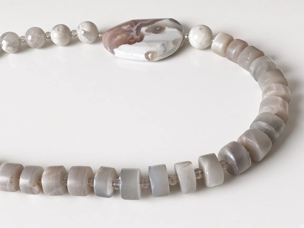 Hue La La Gems handcrafted statement necklace featuring taupe and cream semi-precious stone beads and a focal stone.