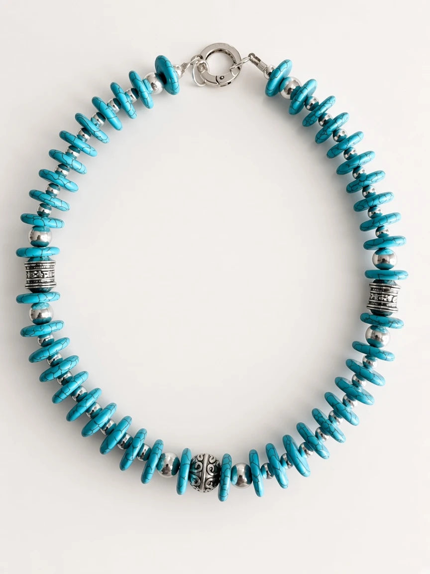 Hue La La Gems turquoise-style beaded necklace with bright blue disc beads and polished silver-tone metal spacers.