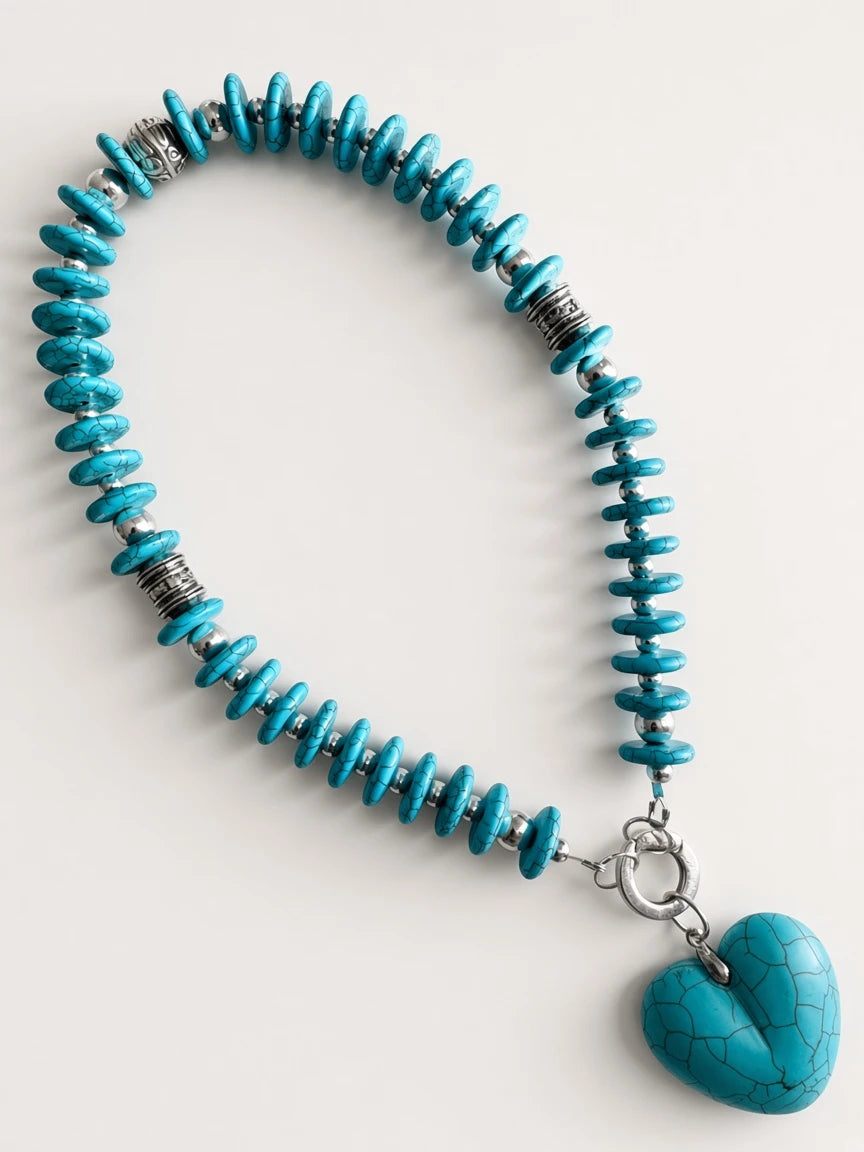 Hue La La Gems turquoise beaded heart pendant necklace with silver-tone spacers and a toggle clasp on white background