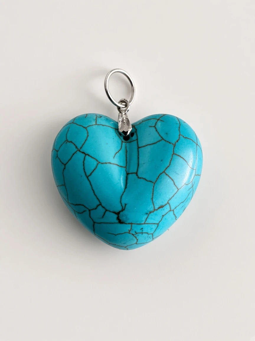 Hue La La Gems turquoise-style puffed heart pendant with black veining and a silver-tone bail on a white background