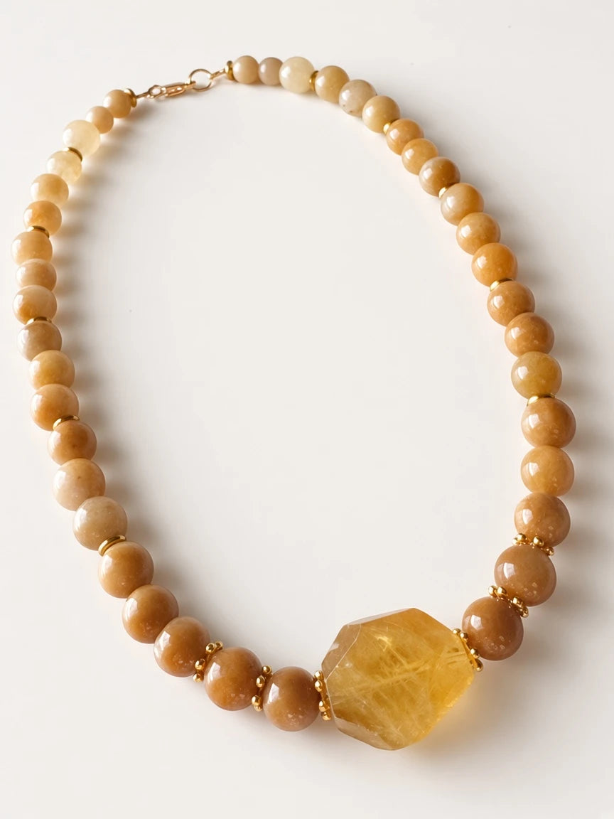 Hue La La Gems yellow jade beaded necklace with a faceted citrine-style centerpiece and gold-tone spacers